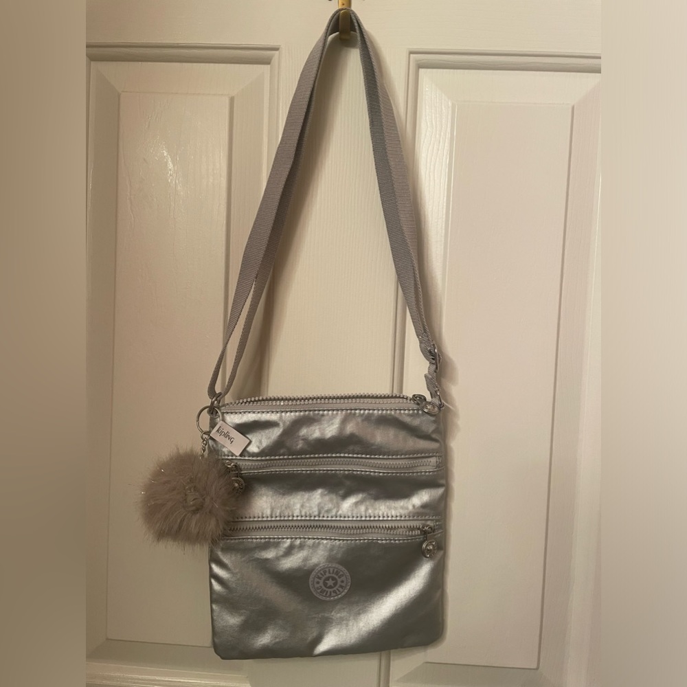 🐵 KIPLING 🙊 Cross body bag/Metallic/New without Tags/Pom pom monkey keychain